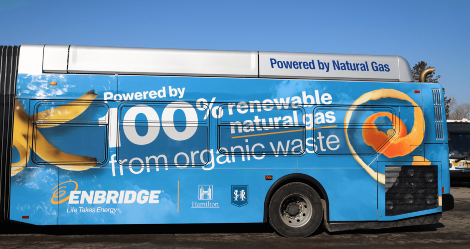 Close up of side of Hamilton bus with blue and food scrap graphic wrap
