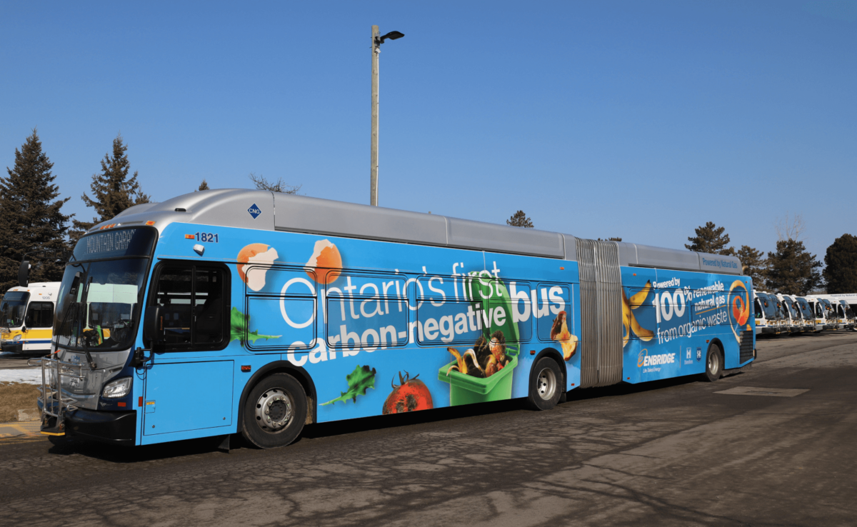 A bus from Hamilton wrapped with a blue wrapper with food scraps